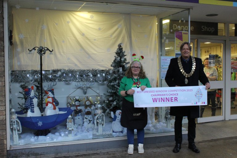 2023 Best Dressed Window Chairman’s Choice winner – Jo Luxton of YMCA Coalville Branch and NWLDC Chairman Councillor Ray Morris
