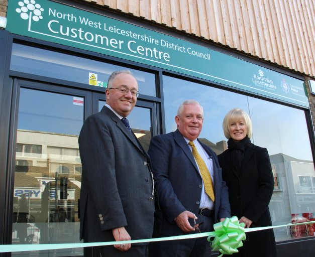 Rupert Matthews, Police and Crime Commissioner for Leicester, Leicestershire and Rutland, Councillor Robert Ashman, Deputy Leader of North West Leicestershire District Council and Allison Thomas, Chief Executive of North West Leicestershire District Council celebrate the opening of the new Customer Centre in Coalville town centre.