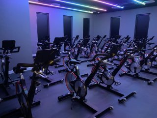 Group spin studio in darkness at Whitwick and Coalville Leisure Centre